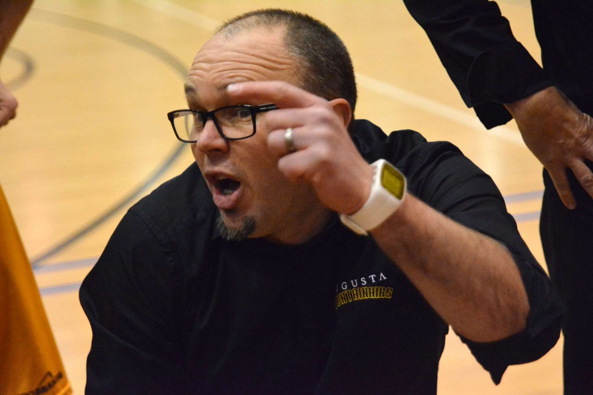 Basketball coach brings experience, passion
